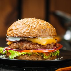 Hi-Five Hot Dogs & Stuff - Our Fancy Burger made w/1/4 LB American Beef includes American Cheese, Lettuce, Tomato, Diced Onions, Homemade Dill Pickles, Hi-Five Sauce.