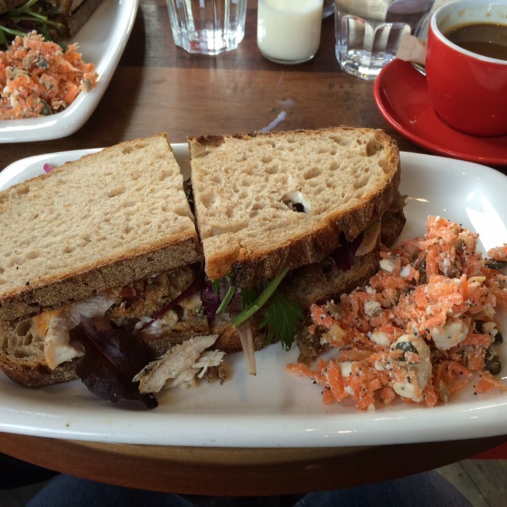 Roast chicken sandwich with stuffing on granary. Side of carrot and feta. Seriously good. Seriously addictive. Roast chicken sandwich with stuffing on granary. Side of carrot and feta. Seriously good. Seriously addictive.