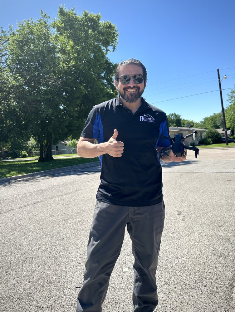 Slide of The Roofing Couple