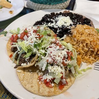 Sabroso! Mexican Grill - One steak taco and one pork, with a side of black beans and rice. - Mexican Near Me - Chicago, Illinois