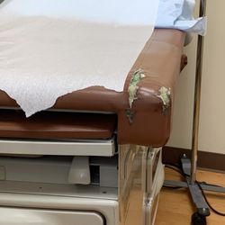 IHA Urgent Care - Domino's Farms - Large rips in exam table