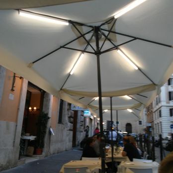 Da Trani - Outside seating al fresco except for the garbage trucks passing by - Seafood Near Me - Rome, RM Da Trani - Outside seating al fresco except for the garbage trucks passing by - Seafood Near Me - Rome, RM