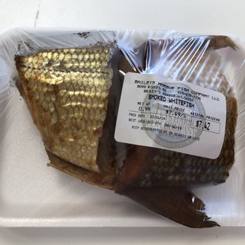 Bailey's Harbor Fish Company - a fish wrapped in plastic - Seafood Markets Near Me - Baileys Harbor, Wisconsin Bailey's Harbor Fish Company - a fish wrapped in plastic - Seafood Markets Near Me - Baileys Harbor, Wisconsin