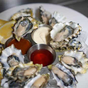 Ferris' Burger & Oyster Bar - Fresh plated oysters at Ferris' Oyster Bar, Victoria BC - Seafood Near Me - Victoria, British Columbia Ferris' Burger & Oyster Bar - Fresh plated oysters at Ferris' Oyster Bar, Victoria BC - Seafood Near Me - Victoria, British Columbia