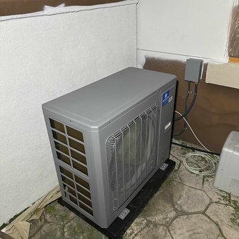 AIR BLUE HVAC - Heat pump compressor outside. You can see that the HOA's painting project was happening at the same time. - Heating & Air Conditioning/HVAC Near Me - North Tustin, California AIR BLUE HVAC - Heat pump compressor outside. You can see that the HOA's painting project was happening at the same time. - Heating & Air Conditioning/HVAC Near Me - North Tustin, California