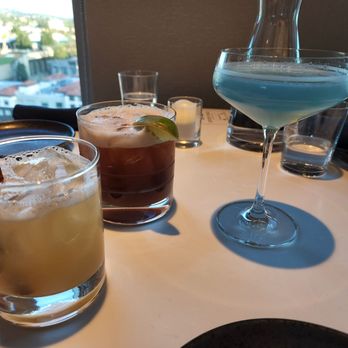 Study Hall Rooftop Lounge - The drinks we ordered, from left to right: Not Toddy (yellow), Campus Bird (reddish brown), Parfait Amour (blue). - Lounges Near Me - Berkeley, California