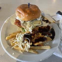 Clark's Eatery - Nashville Hot chicken sandwich and a side of poutine fries.