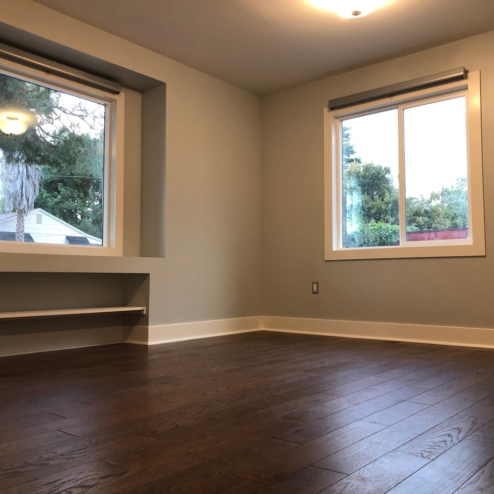 USA Builders - empty room with hardwood floors and windows - General Contractors Near Me - Winnetka, California USA Builders - empty room with hardwood floors and windows - General Contractors Near Me - Winnetka, California