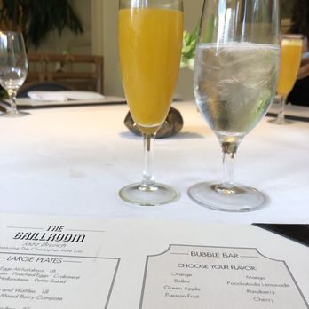 The Grill Room - Mango mimosa - New American Near Me - New Orleans, Louisiana