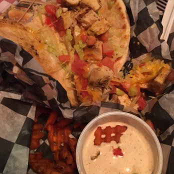 Huey's Downtown - Fiesta chicken wrap with sweet potato fries - Burgers Near Me - Memphis, Tennessee Huey's Downtown - Fiesta chicken wrap with sweet potato fries - Burgers Near Me - Memphis, Tennessee