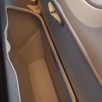 British Airways - Because of the curved effect in the upstairs cabin, there is this handy storage bin beneath the windows, even in economy. - Airlines Near Me - West Drayton, XGL