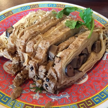 Shanghai Dumpling King - "Vegetarian Goose" from the appetizer menu: tofu skin stuffed with mushrooms, served cold - Shanghainese Near Me - San Francisco, California Shanghai Dumpling King - "Vegetarian Goose" from the appetizer menu: tofu skin stuffed with mushrooms, served cold - Shanghainese Near Me - San Francisco, California