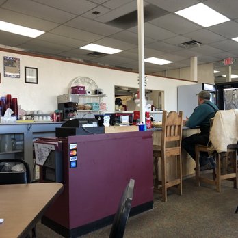Virginia's Place - a woman sitting at a table - Breakfast & Brunch Near Me - Edmond, Oklahoma Virginia's Place - a woman sitting at a table - Breakfast & Brunch Near Me - Edmond, Oklahoma