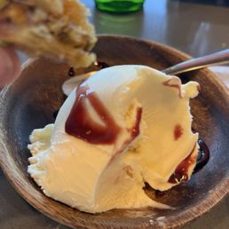Pistachio treat with vanilla ice cream.