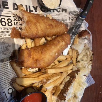 Red Lobster - Fish and chips with a baked potato instead of french fries. They sent out both. - Seafood Near Me - Tallahassee, Florida Red Lobster - Fish and chips with a baked potato instead of french fries. They sent out both. - Seafood Near Me - Tallahassee, Florida