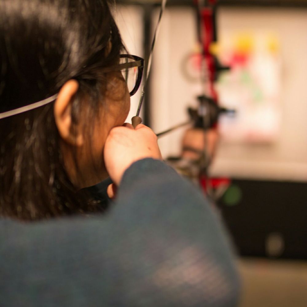 Gotham Archery - Girlfriend aiming for the competitive shooting - Archery Near Me - Brooklyn, New York