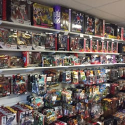 Transfan2's Shop N' Look - Just one of their walls filled with toys