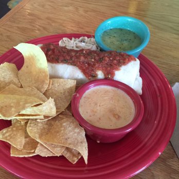 Black Bear Burritos - Burrito with mild salsa, Queso, kiwi salsa, chips and slaw - Mexican Near Me - Morgantown, West Virginia Black Bear Burritos - Burrito with mild salsa, Queso, kiwi salsa, chips and slaw - Mexican Near Me - Morgantown, West Virginia