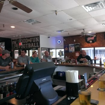 Tom's Bullpen - a bar with people sitting at the bar - Sports Bars Near Me - Dover, Delaware Tom's Bullpen - a bar with people sitting at the bar - Sports Bars Near Me - Dover, Delaware