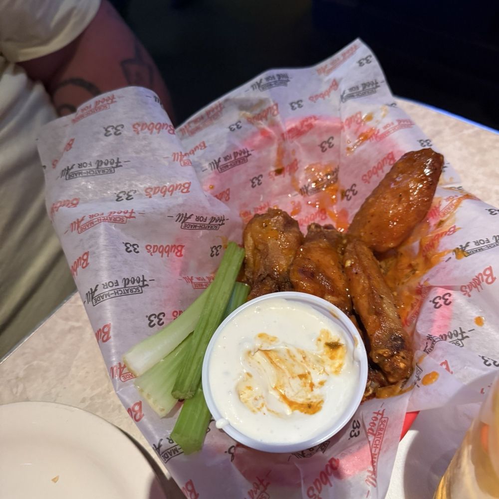 Bubba's 33 - Classic Buffalo wings with homemade blue cheese or ranch with crispy carrots - Pizza Near Me - Chesapeake, Virginia