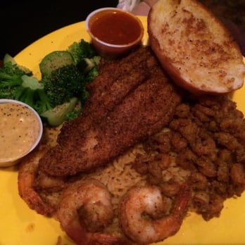 Crawdaddy's Bar and Grill - Blackened catfish, fried shrimp and crawfish. With garlic bread and veggies. - Cajun/Creole Near Me - El Paso, Texas