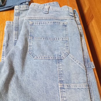 Boot Barn - Lee Dungy carpeter pants never washed or worn yet 6084368740 15 apiece if you by the pants I'll give you the shorts - Light blue carpenter pants with a large back pocket and additional side pockets are displayed on a wooden surface, with other denim clothing partially visible. - Shoe Stores Near Me - Janesville, Wisconsin