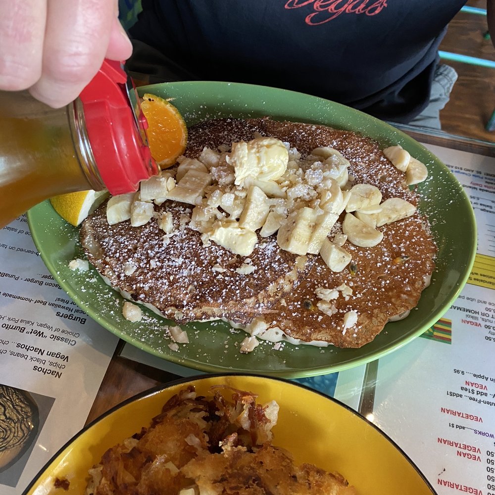 Pele's Kitchen - Husby's short stack topped with macadamia nuts and bananas (they were out of pineapple) - Breakfast & Brunch Near Me - Pahoa, Hawaii Pele's Kitchen - Husby's short stack topped with macadamia nuts and bananas (they were out of pineapple) - Breakfast & Brunch Near Me - Pahoa, Hawaii