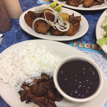 Latin Cafe - fried pork chunks with side of black bean, steam rice and plantain. - Cuban Near Me - Miami Beach, Florida