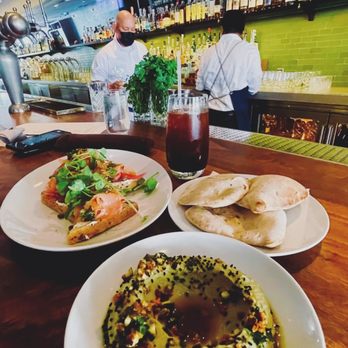 Farmshop - Avocado Hummus and fresh baked pita and salmon from lunch menu - Breakfast & Brunch Near Me - Larkspur, California Farmshop - Avocado Hummus and fresh baked pita and salmon from lunch menu - Breakfast & Brunch Near Me - Larkspur, California