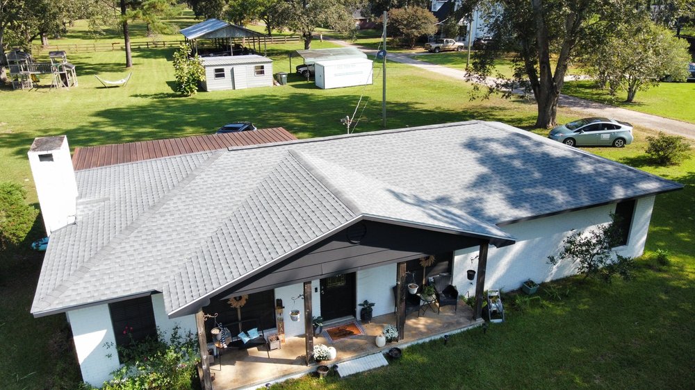 Slide of Big Fish Roofs & Restoration