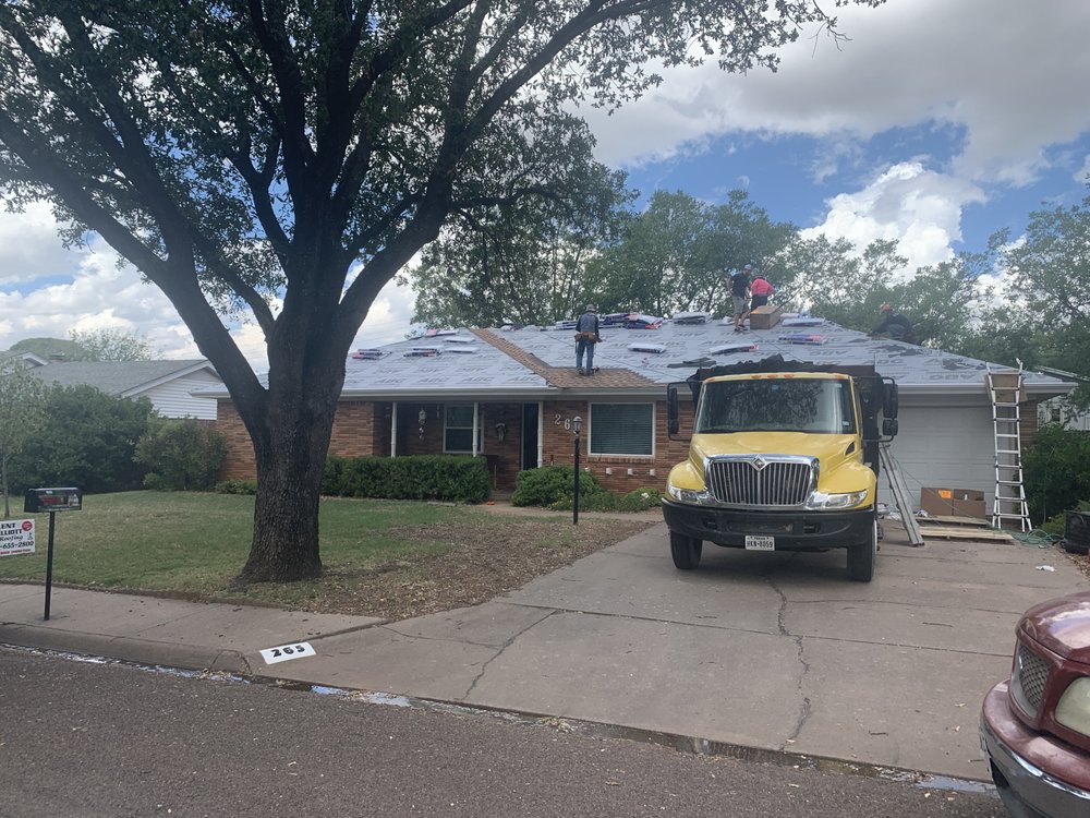 Slide of Kent Elliott Roofing