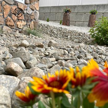 OK Valley Landscaping & Maintenance - flowers in front of a building - Lawn Services Near Me - Penticton, British Columbia OK Valley Landscaping & Maintenance - flowers in front of a building - Lawn Services Near Me - Penticton, British Columbia