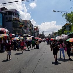 Baclaran Shopping - Umbrellas cause its hot and getting dark is a no no here.