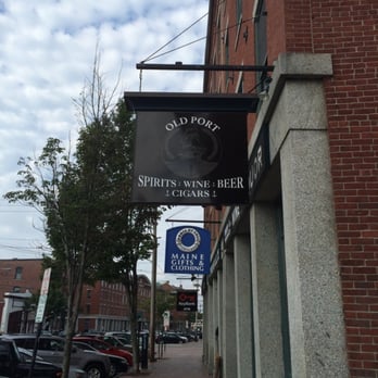 Old Port Spirits & Cigars - a sign on the side of a building - Tobacco Shops Near Me - Portland, Maine Old Port Spirits & Cigars - a sign on the side of a building - Tobacco Shops Near Me - Portland, Maine