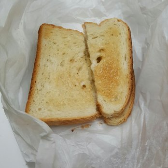 Cafe 58 - Sad.  Is it that hard to cut toast evenly? Slow service, rude owner.  Don't eat here - Pizza Near Me - Brooklyn, New York