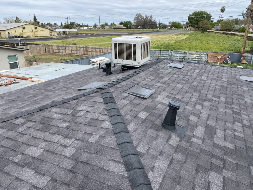 Slide of Modern Roofers and Restoration