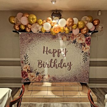 Nutmeg Restaurant - Birthday decorations and banner covering the fireplace. - Venues & Event Spaces Near Me - East Windsor, Connecticut Nutmeg Restaurant - Birthday decorations and banner covering the fireplace. - Venues & Event Spaces Near Me - East Windsor, Connecticut
