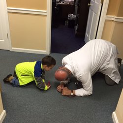 Clifford Family Practice - That's Dr C playing cars with my son so he wouldn't be scared