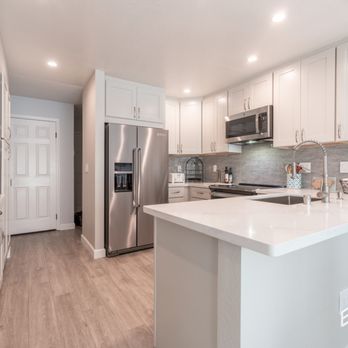 Emoh Remodeling - a clean kitchen with stainless steel appliances - General Contractors Near Me - Glendale, California