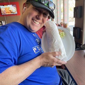 Photo of Chüyz Taco Shop - San Diego, CA, United States. I birthed a Surf and Turf Cali Burrito. This baby is HUGE!