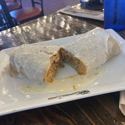 Burrito with ground beef, rice and cheese
