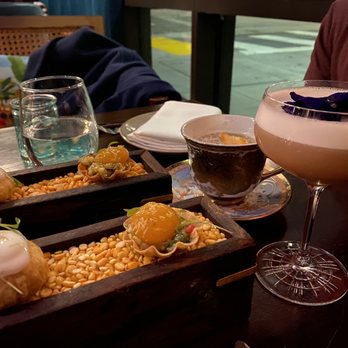 ROOH - Dahl puri (far left), pani puri (middle), Mysore sour (in the teacup), and anar-kali (far right) - Indian Near Me - San Francisco, California ROOH - Dahl puri (far left), pani puri (middle), Mysore sour (in the teacup), and anar-kali (far right) - Indian Near Me - San Francisco, California