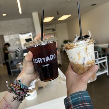 Cortado Coffee - cold brew with sugar free vanilla syrup iced einspanner latte with whole milk - Coffee & Tea Near Me - Garden Grove, California