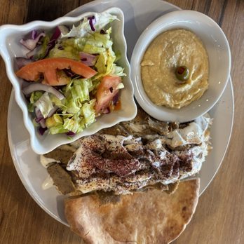 Extra Hummus - Two Beef & Lamb Gyro plates; one with artichoke and pesto hummus, and one with garlic hummus. - Greek Near Me - Rancho Cordova, California Extra Hummus - Two Beef & Lamb Gyro plates; one with artichoke and pesto hummus, and one with garlic hummus. - Greek Near Me - Rancho Cordova, California