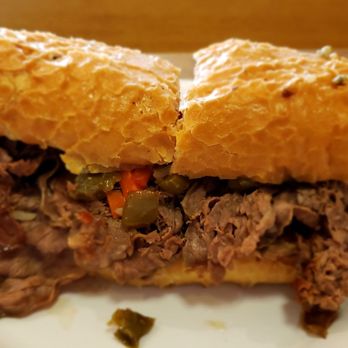 Mario's Italian Grill - The very dry Italian beef dipped, only the whole bun is dipped then sliced and filled with Italian beef so it's dry. - Italian Near Me - Milwaukee, Wisconsin Mario's Italian Grill - The very dry Italian beef dipped, only the whole bun is dipped then sliced and filled with Italian beef so it's dry. - Italian Near Me - Milwaukee, Wisconsin