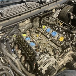 Performance Brake and Muffler - Photo of when I pulled off the intake manifold along with the left bank valve cover.