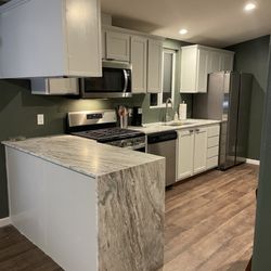 All Pro Countertops - New counters with waterfall edge