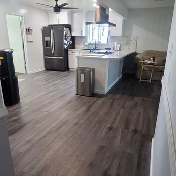 Ability Construction - Wall Removal creating Open Concept of the kitchen & Living Room. Installation of a 20ft beam - General Contractors Near Me
