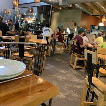 When Pigs Fly Pizzeria - people sitting at tables - Pizza Near Me - Kittery, Maine When Pigs Fly Pizzeria - people sitting at tables - Pizza Near Me - Kittery, Maine