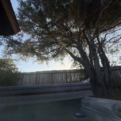 Windsong Cottage Guest Yurt - Area around the hot tub